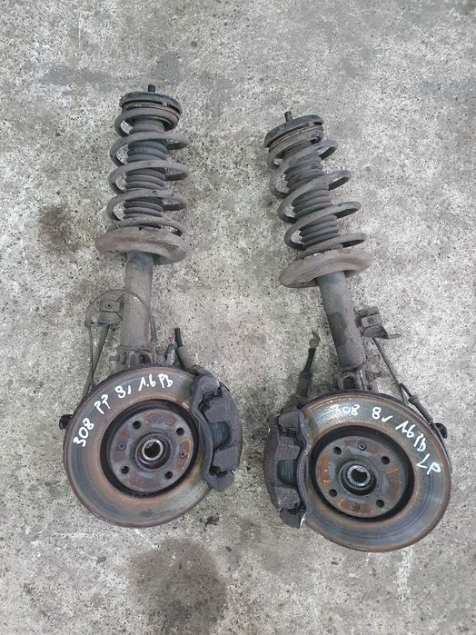 Amortyzator zwrotnica piasta zacisk przód Peugeot 308 T7 1.6 120km