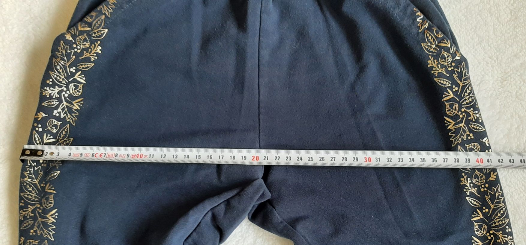 Granatowe spodnie dresowe r.134 endo.