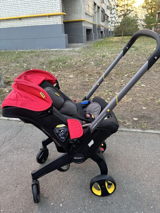 Автокрісло-коляска Doona Child Flame Red