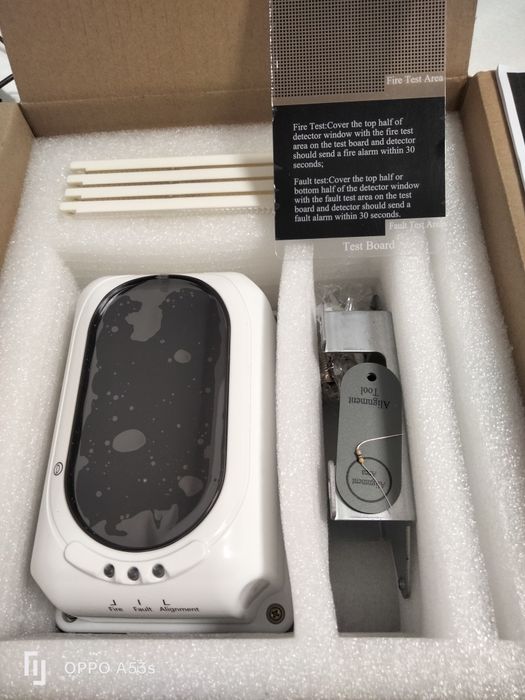 Barreira óptica de detecção de fumo