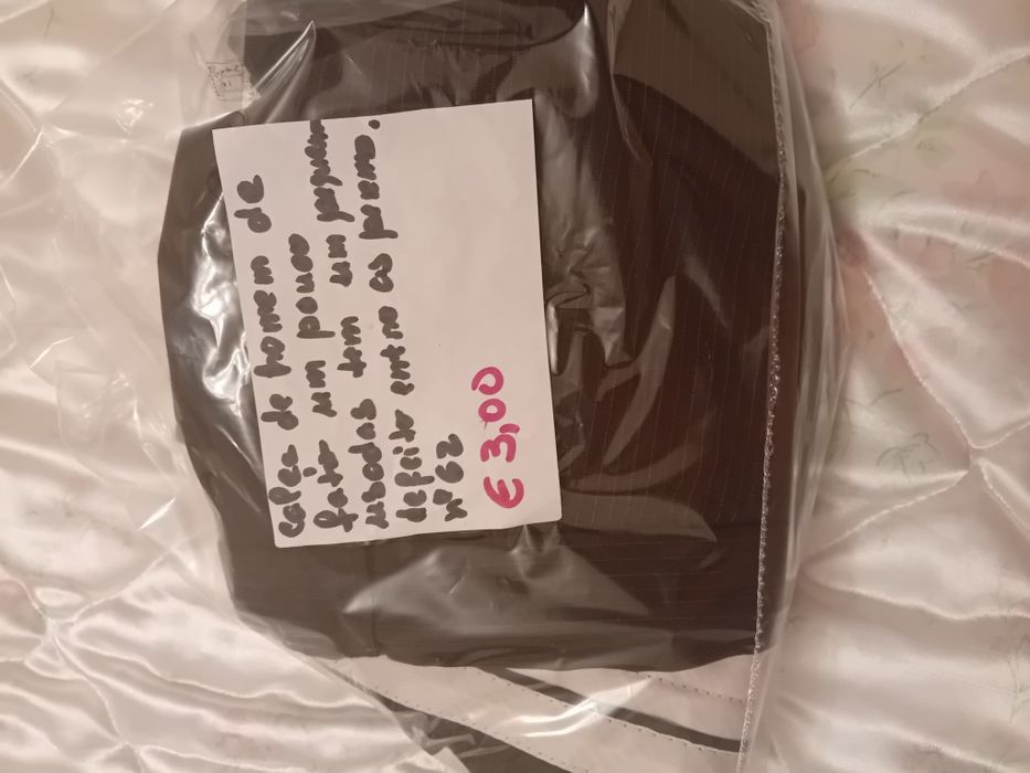 Calças de fato pretas as riscas brancas