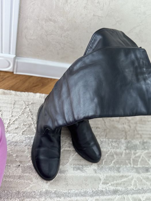 Шкіряні чоботи з високою халявою