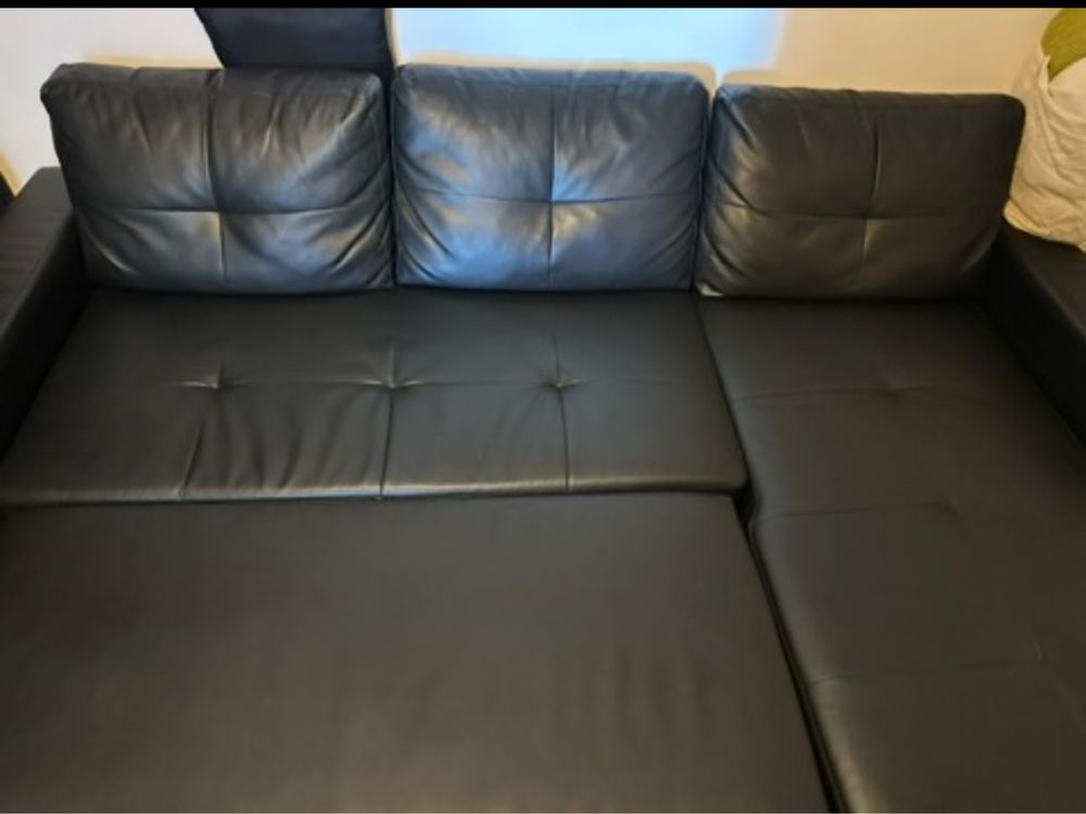 Sofa em pele com opcao de cama
