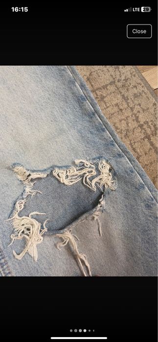 spodnie z dziurami wysoki stan dżinsy jeansy zara niebieskie jasne