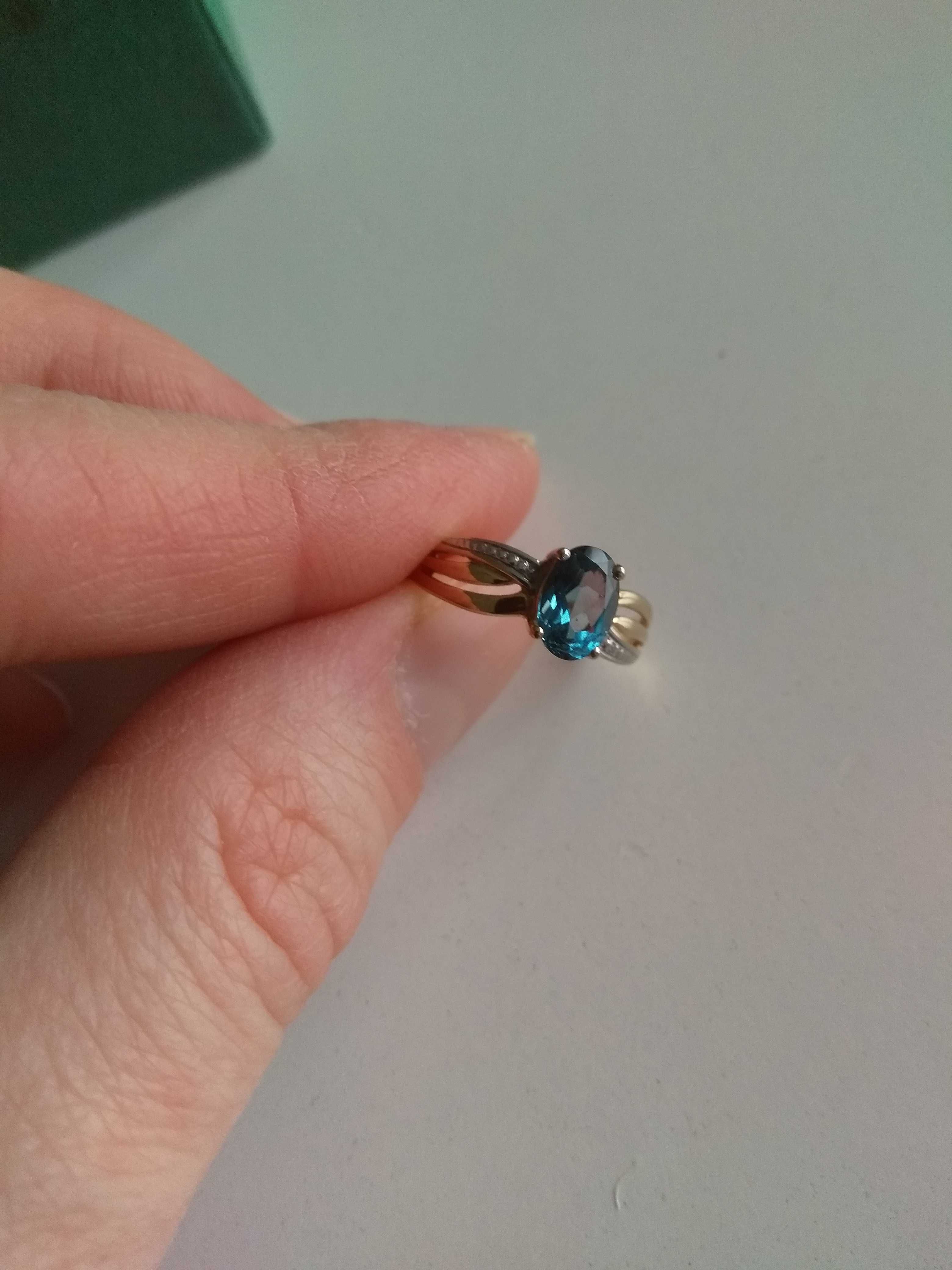 Złoty pierścionek Yes topaz London blue rozmiar 8.5