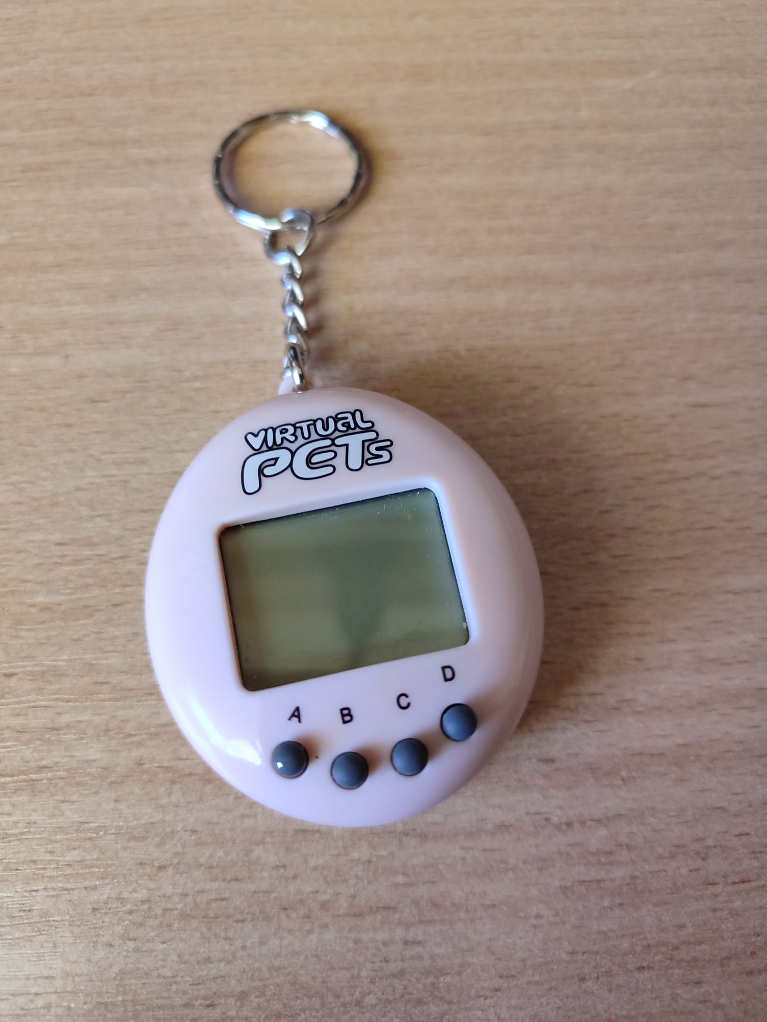 Тамагочі virtual PETs, іграшка стан нової
