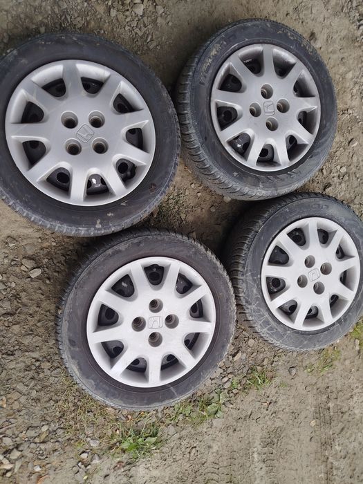 Felgi stalowe 14cal  z oponami i kołpakami honda