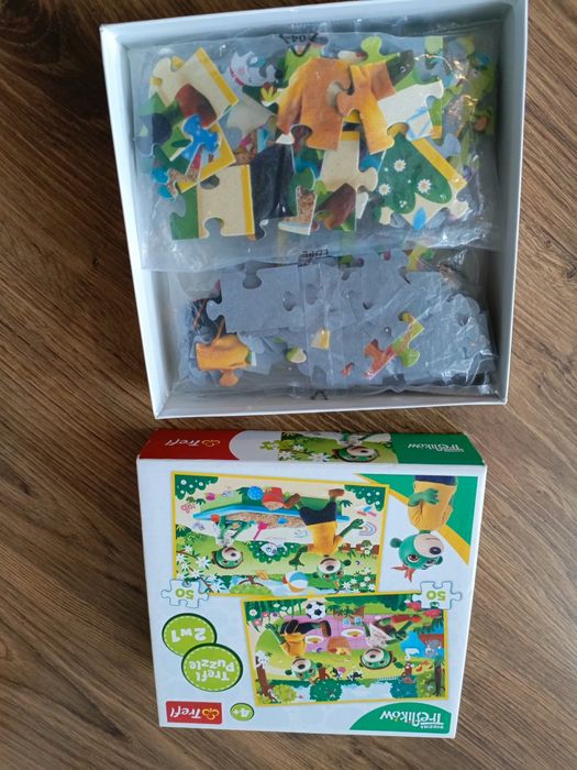 2 zestawy puzzli dla dzieci "Świnka Peppa" i "Trefliki"