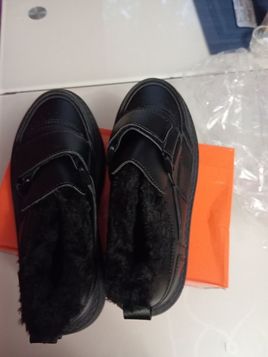 Нові зимові кросівки