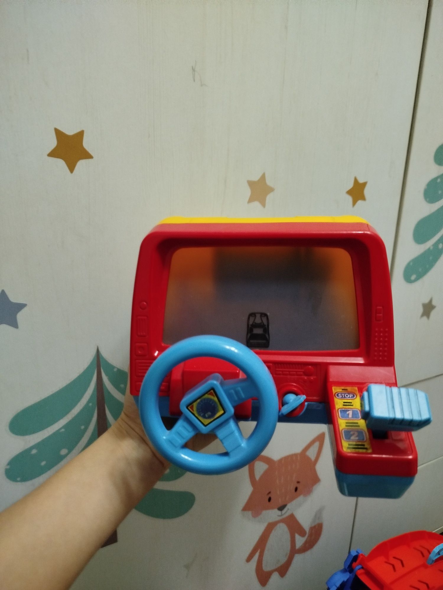 Автосимулятор, приставка, развивающая игрушка.