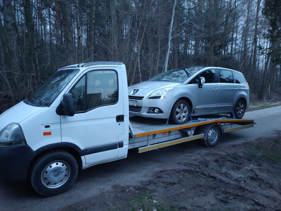 Autolaweta Laweta Pomoc drogowa transport samochodów osobowych maszyn