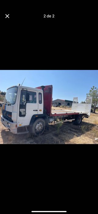 Camião volvo porta máquinas com rampas idraulicas