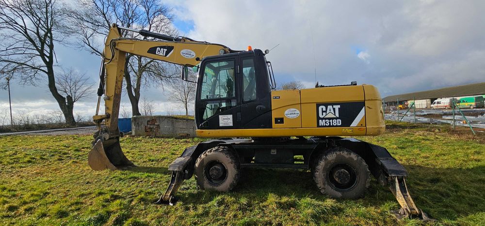 Caterpillar M318D- Koparka kołowa