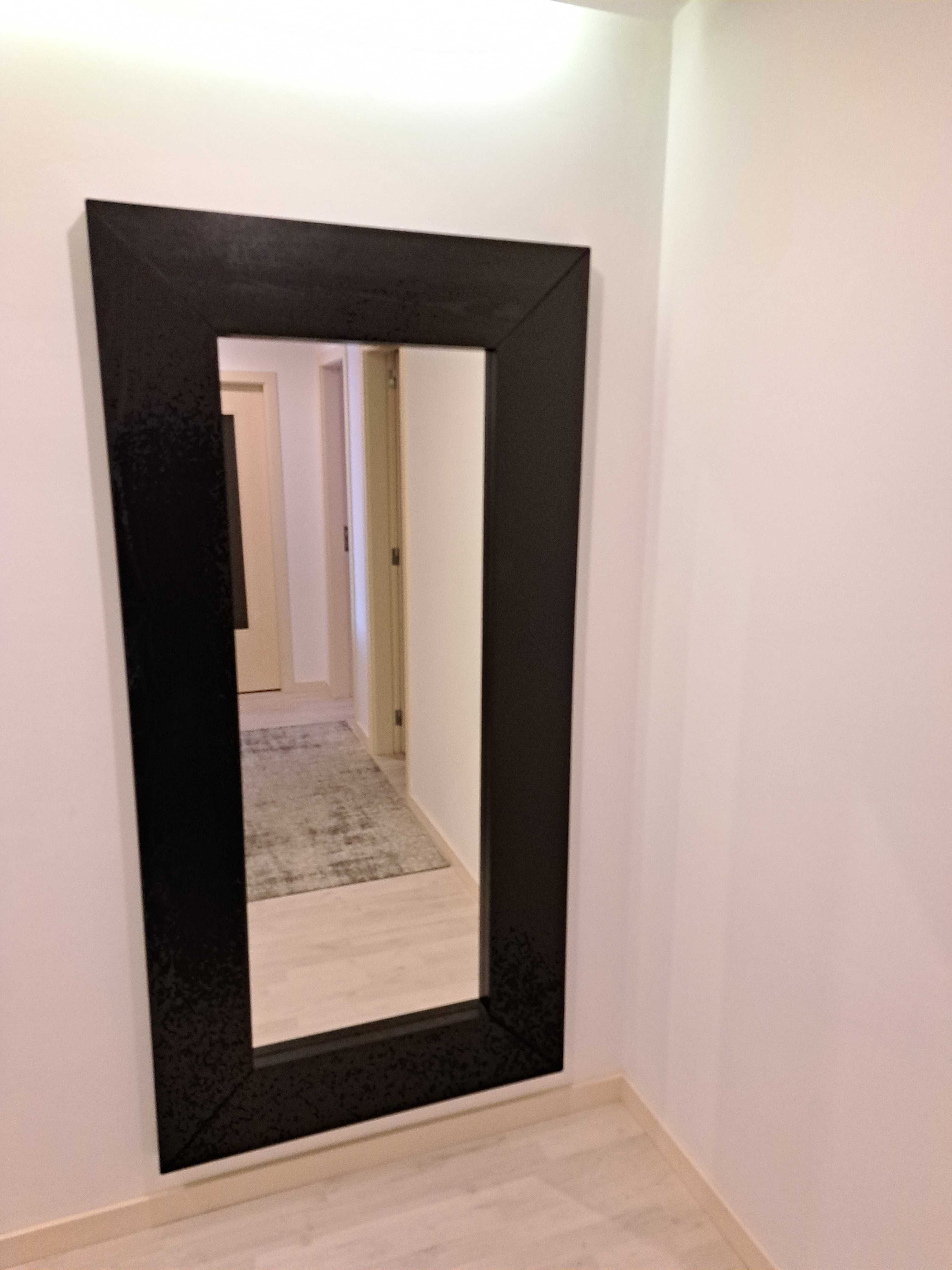 Movel entrada com espelho e quadros