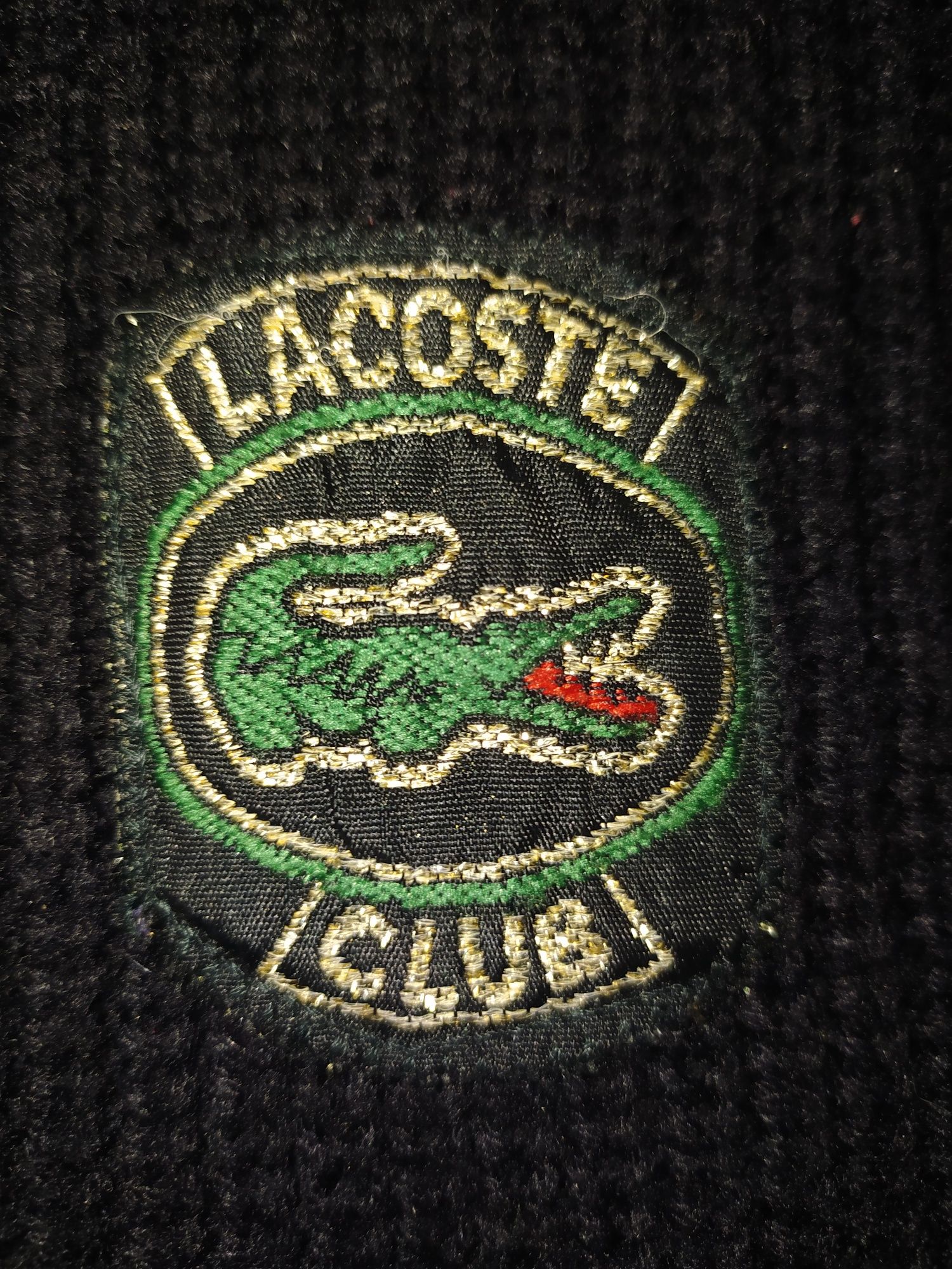 Czarny sweter Lacoste