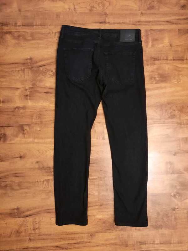 Czarne rurki, spodnie jeansowe Jack&Jones roz. 30/32, M z lekką wadą