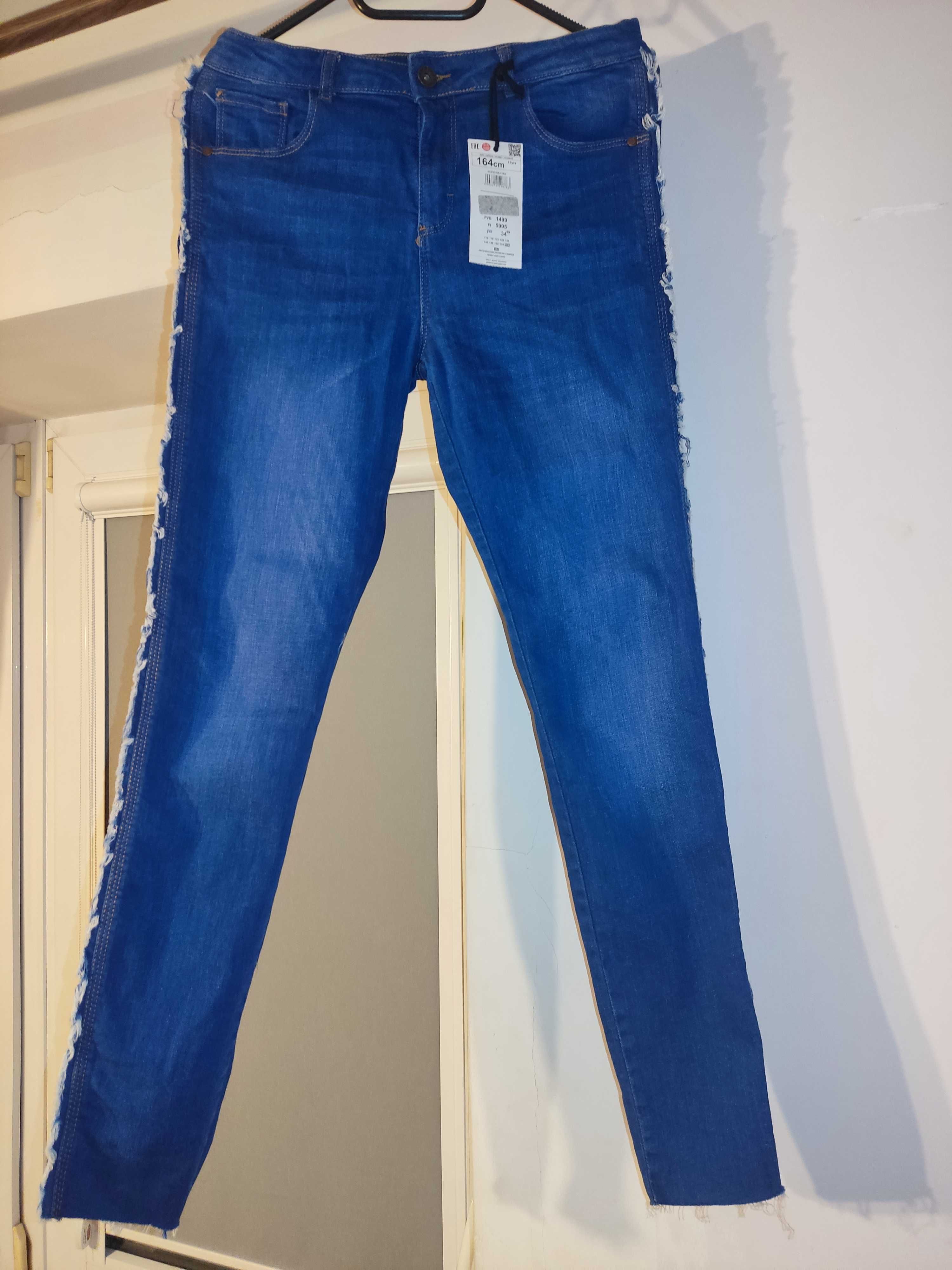 Nove spodnie jeansowe 164cm