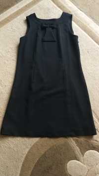Mała czarna krótka sukienka kokarda bez rękawów