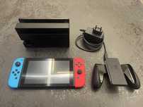 Konsola Nintendo Switch + (Dock, ładowarka, kontroler Grip, Gra)