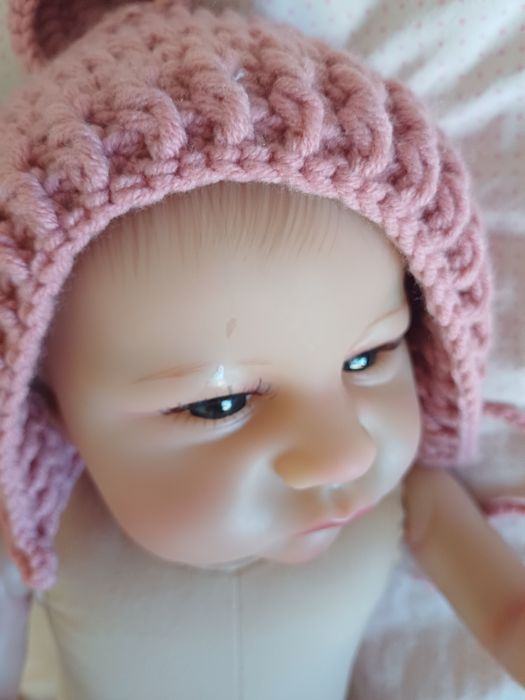 Lalka w typie reborn, drobna wada