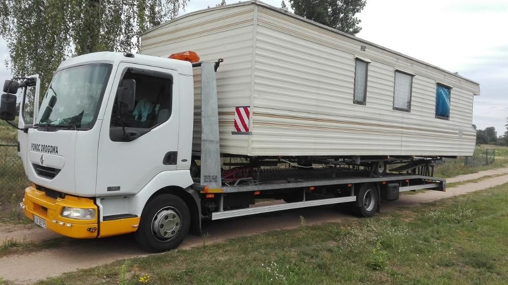 pomoc drogowa laweta transport koparka bus widlak przyczepa kontener