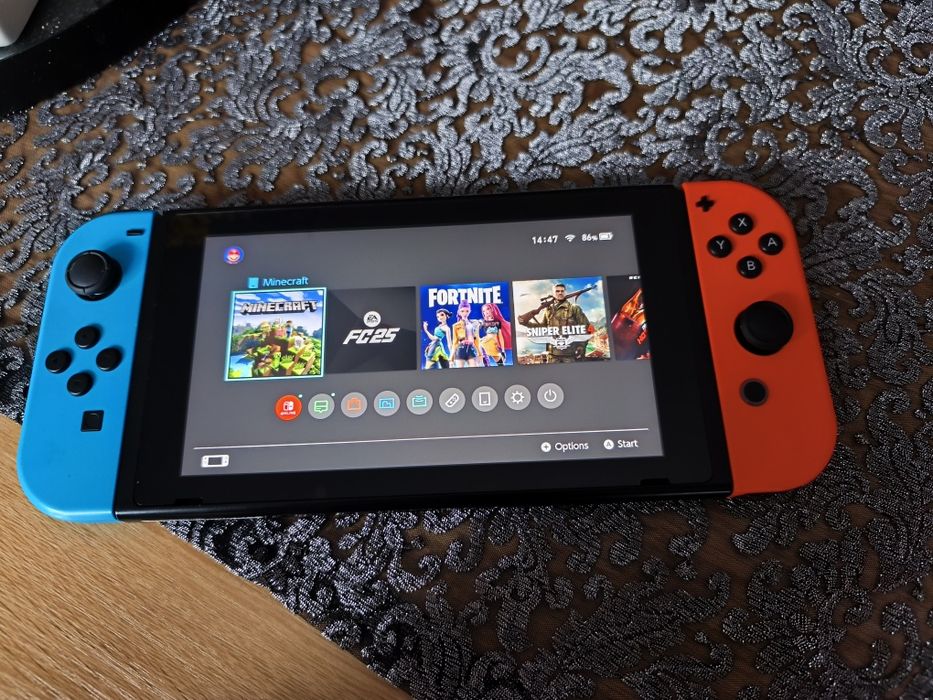 Nintendo switch V2 jak nowe karta 256gb z grami warto