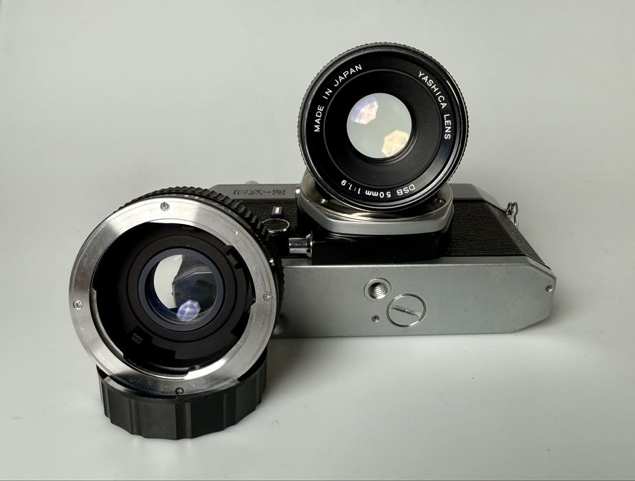 Плівкова Yashica FX-2 з Yashica DSB 50/1.9 та конвертером 2x Yus