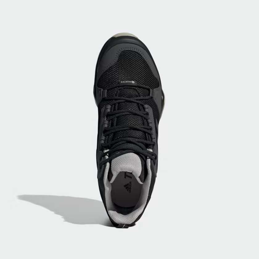 Жіночі трекінгові кросівки Adidas Terrex AX3 Mid. 40.7 EU (25 см)