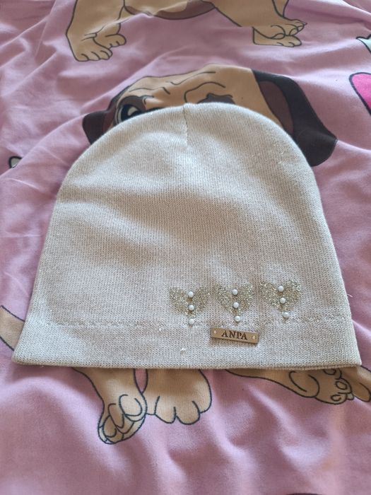 Продам зимові ,демисезонні (весняні -осінні)шапочки для дівчаток