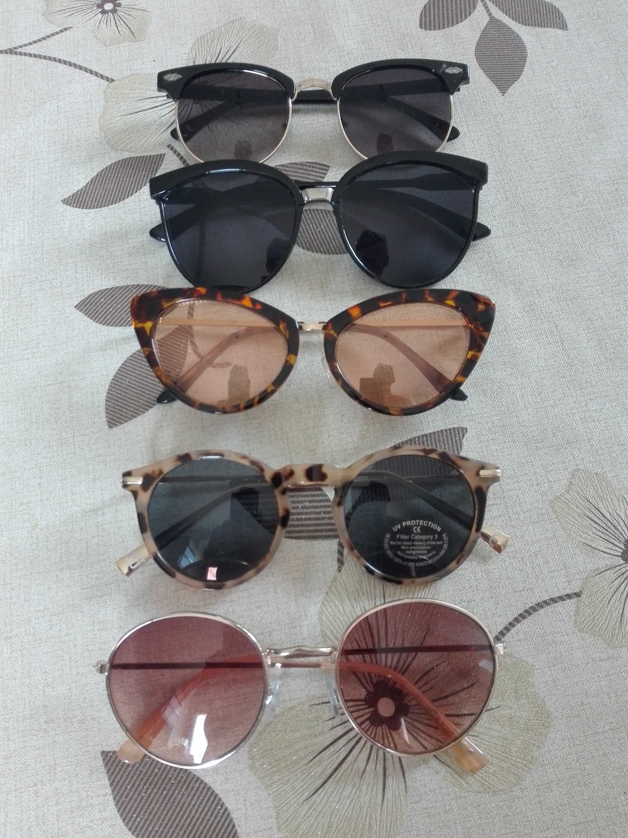 Cztery pary okularów przeciw słonecznych damskch