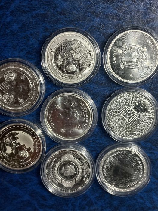 Подарок. Австралия, Британия, США, Токелау, серебро.