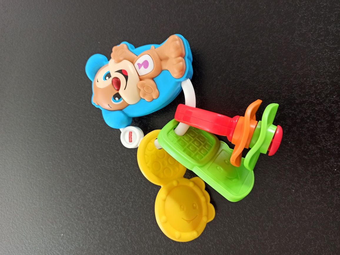 Fisher Price klucze szczeniaczka uczniaczka