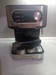 Máquina e moínho de café