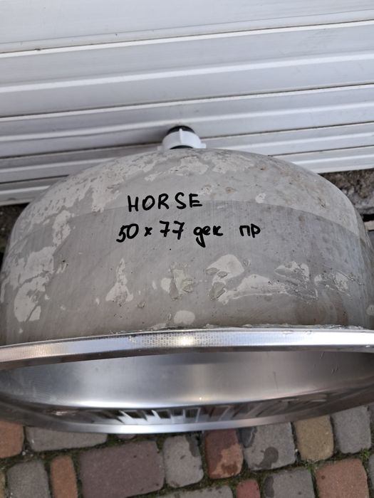 Кухонна мийка з нержавіючої сталі