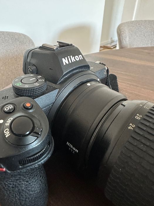 Nikon z5 + 24-70mm 2.8 + ftz + godox v860ii