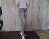 Szare spodnie Zara z poszarpanymi nogawkami Szare jeansy Zara 36