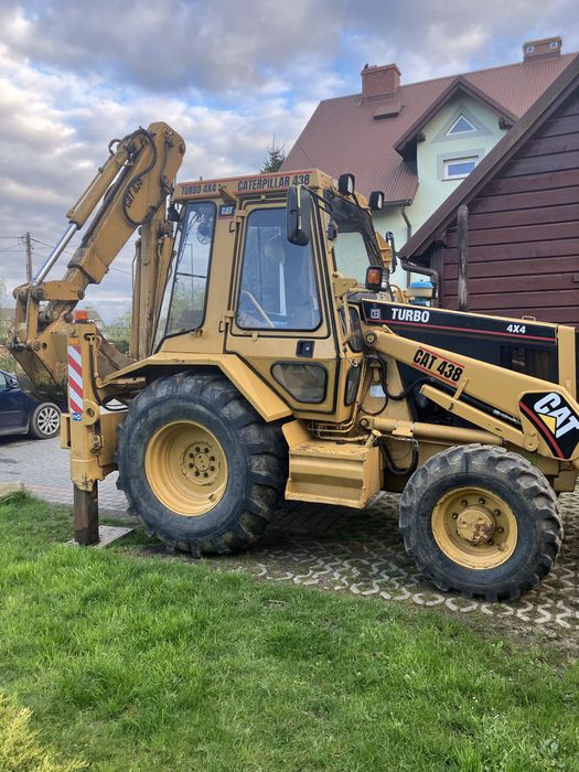 Koparko-ładowarka Caterpillar 438