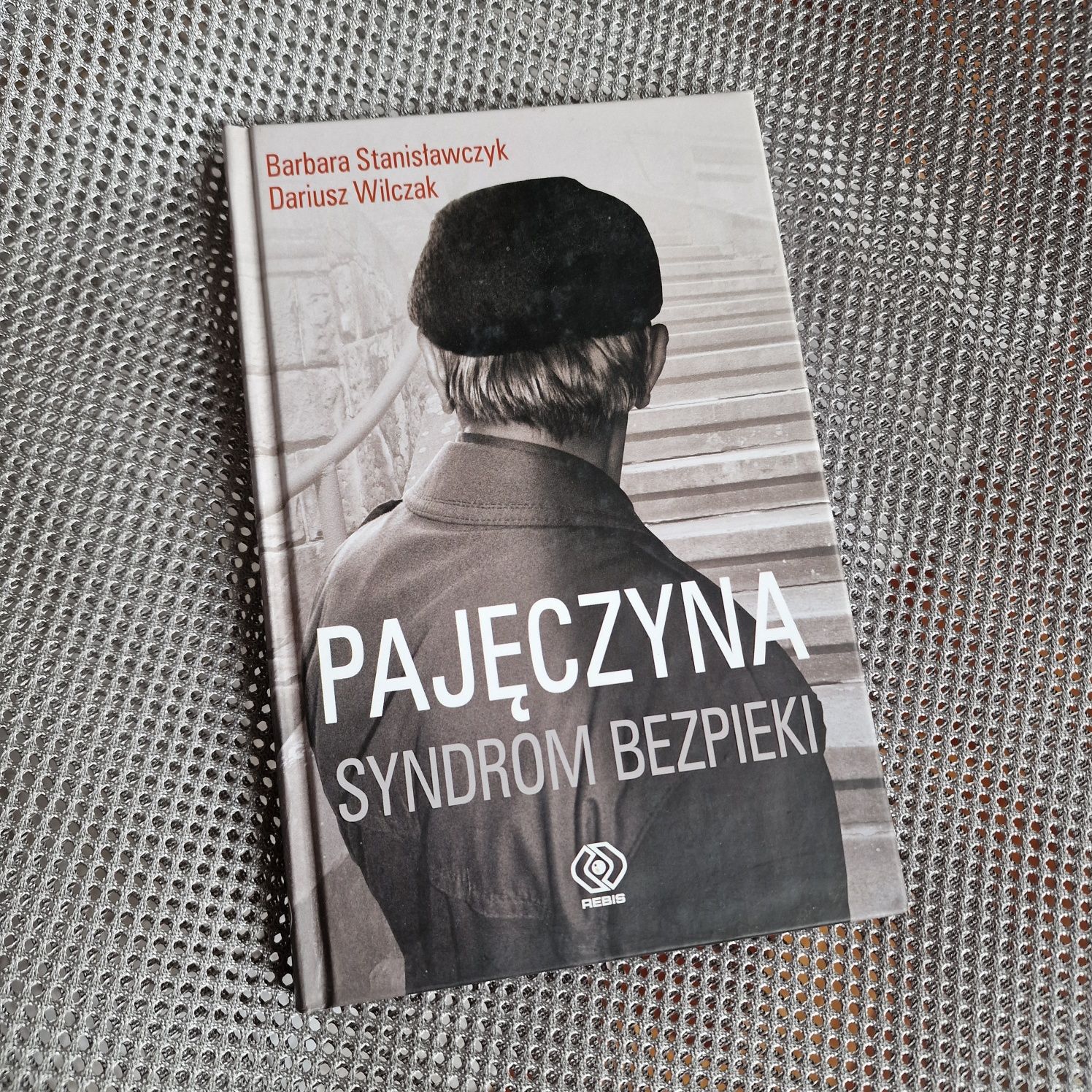 Książka "Pajęczyna - syndrom bezpieki" wyd. REBIS stan idealny