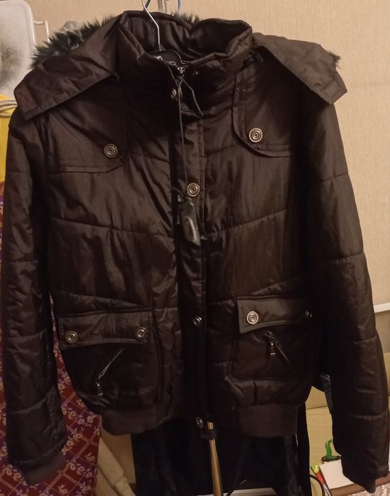 Курточки та  пальто жіночі