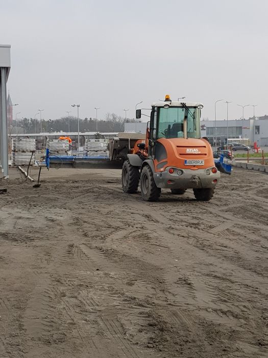 Maszynowe Układanie kostki brukowej utwardzenie terenu brukarstwo