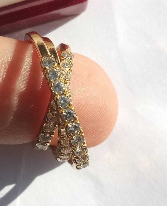 Anel triplo em ouro com brilhantes