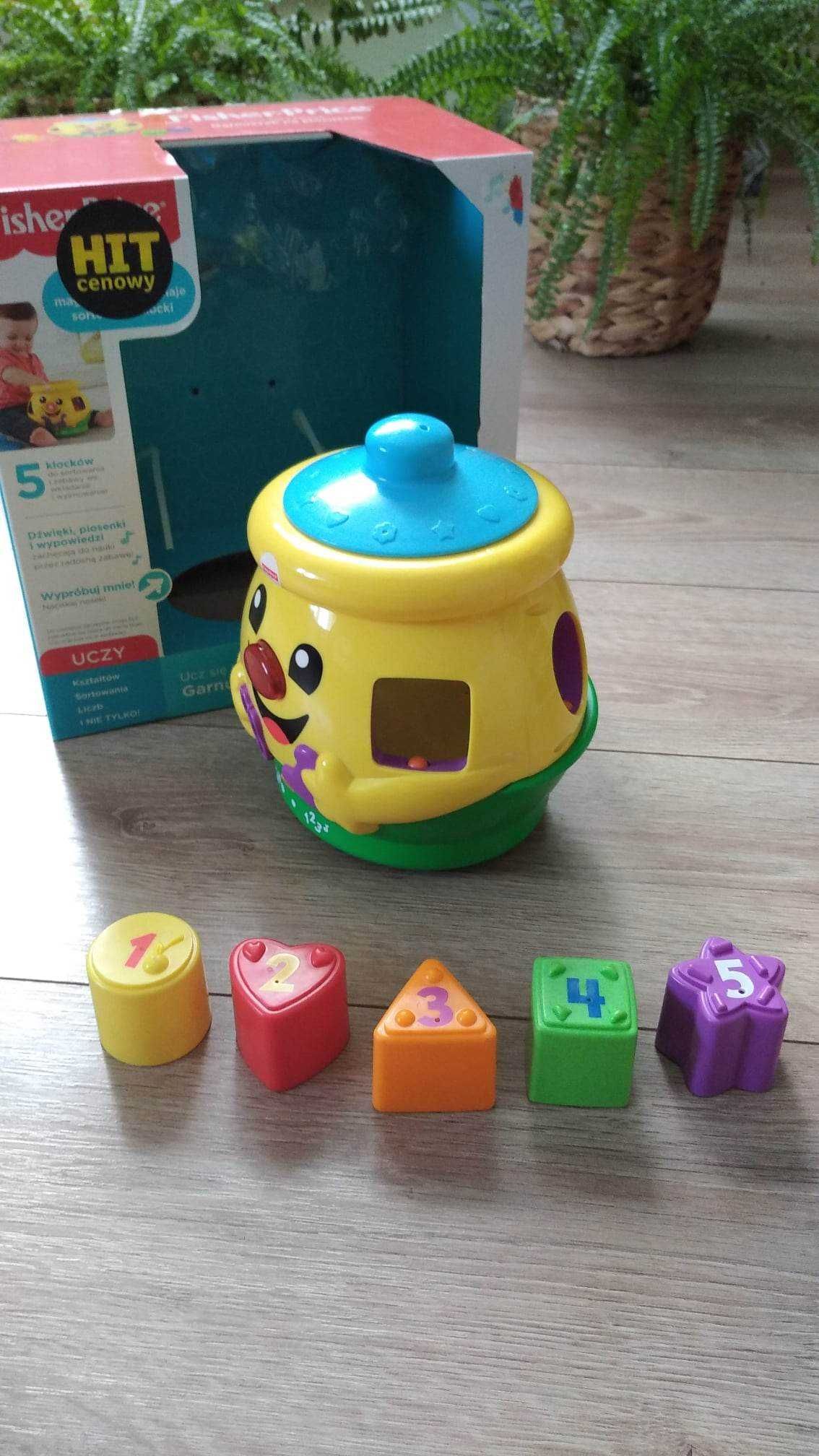 Fisher-Price Garnuszek na klocuszek.