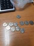 11 moedas de quarto dolar