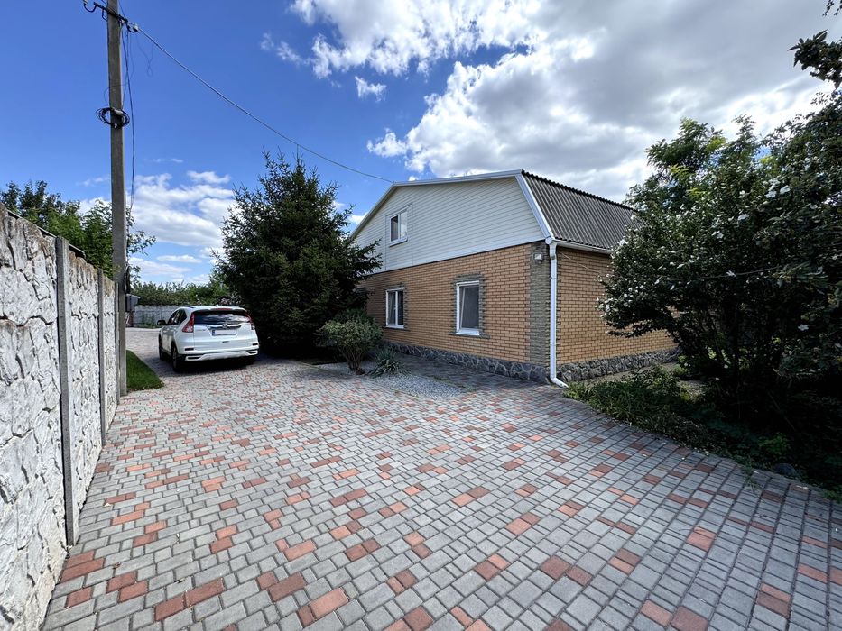 Продам 2-этажный дом в Подгородном, улица Низовая