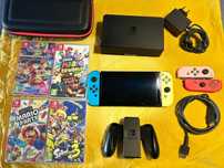 Nintendo Switch OLED com jogos e comandos extra – como nova!