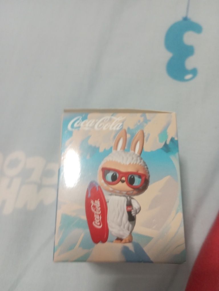 Mini labubu coca cola