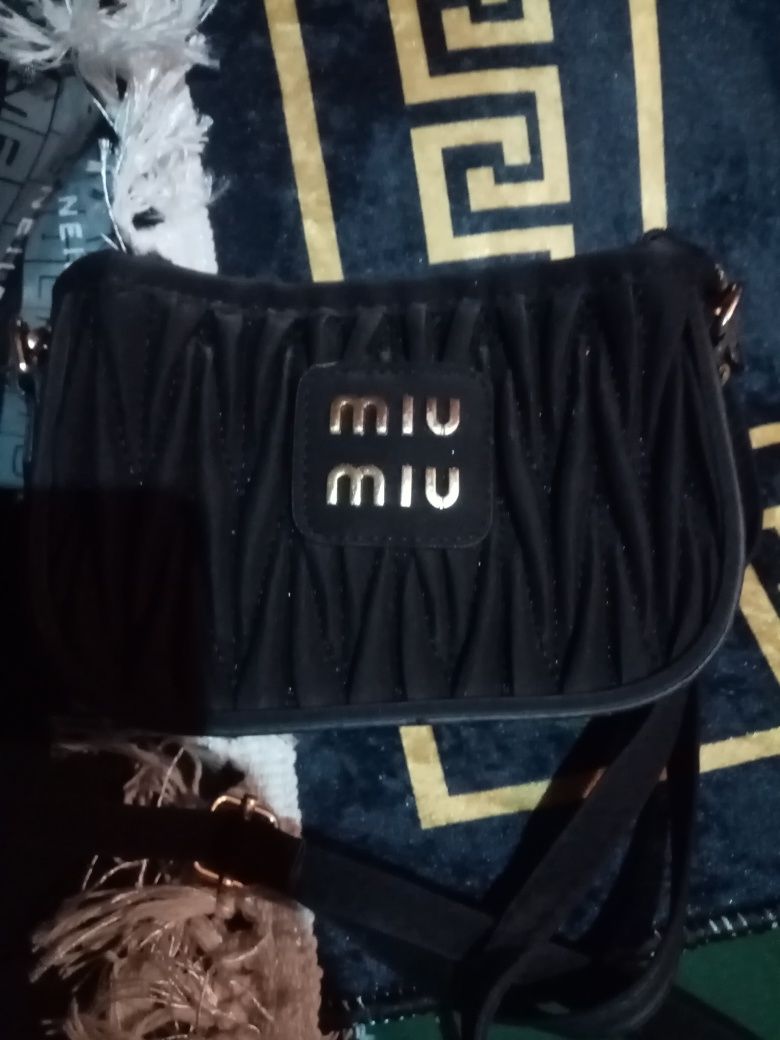 Sprzedam mini torebkę miu miu