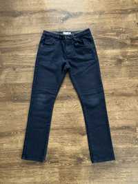 Lekko ocieplane spodnie jeansy Zara romziar 128
