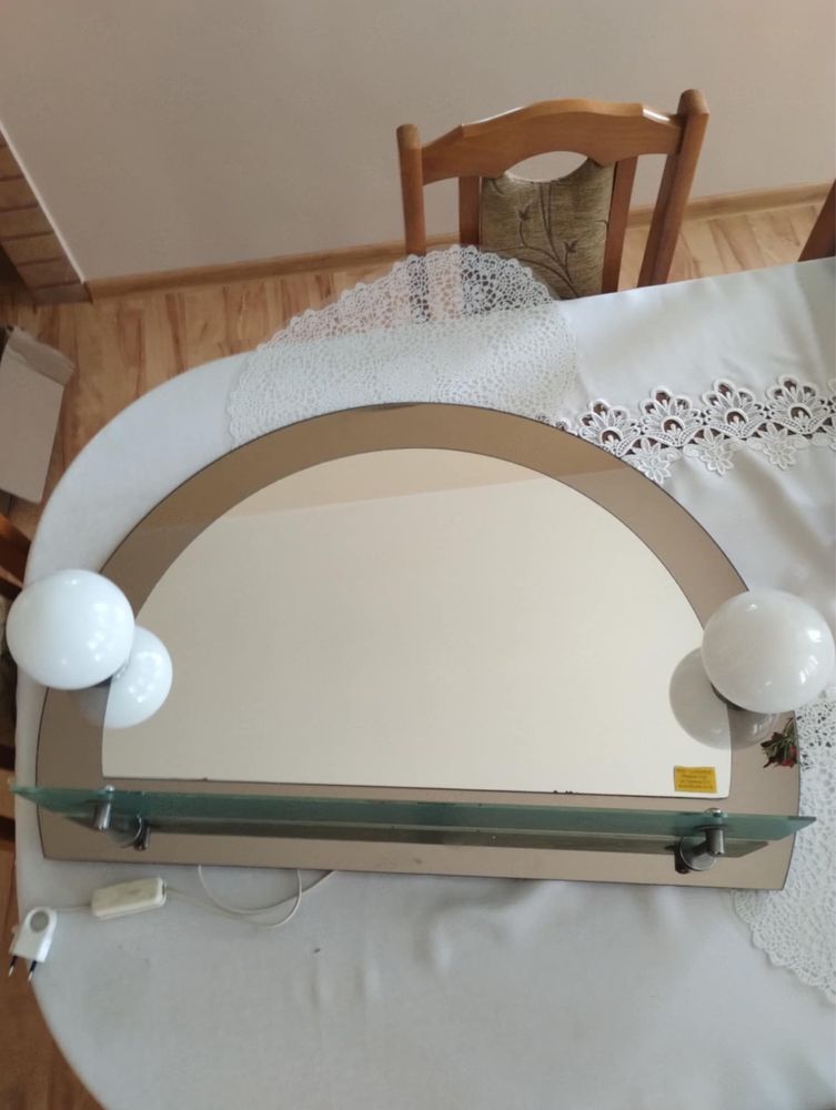 Lustro owalne z półką i oświetleniem