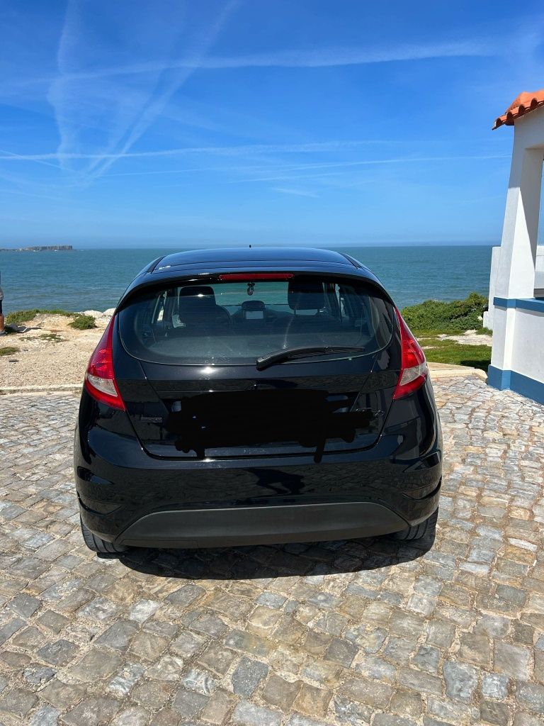 Vendo Ford fiesta 1.4 tdci pintura nova, revisão em dias extras.